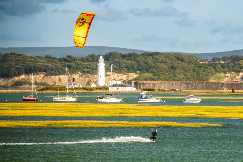 Riding the Wind: Kite Surfing on the Keyhaven Lake, Milford-on-Sea by Jonathan Corbett